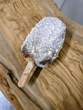 3 White chocolate ice cream with a dark chocolate coating and covered with a white chocolate crumb