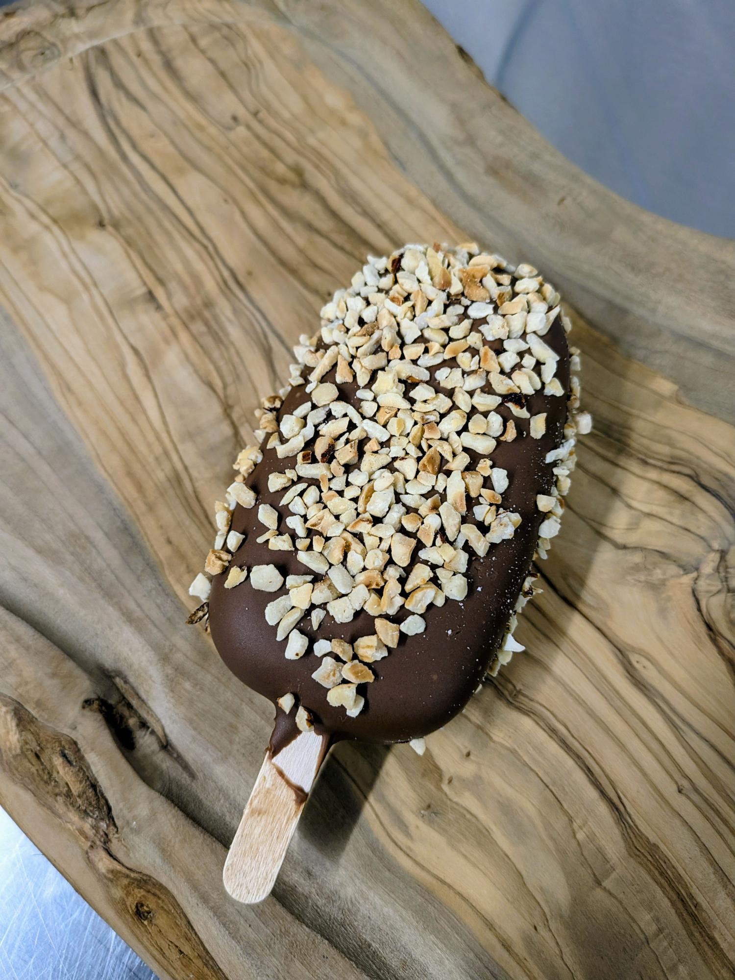 3 Toffee ice cream lolly coated in chocolate with a hazelnut crumb